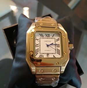 Cartier Gold and White Watch with Blue Hands. Serial # photo 2